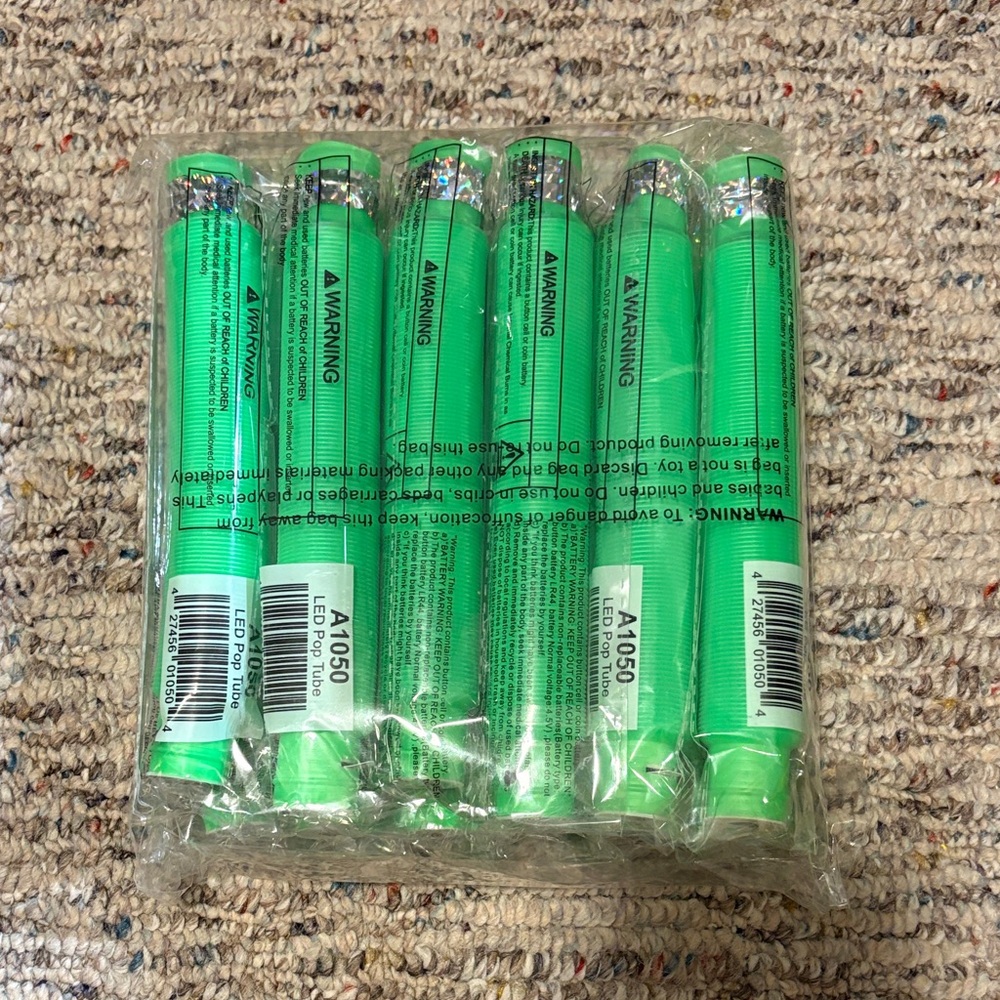 Pack of Green Glow LED pop tube fidget toy